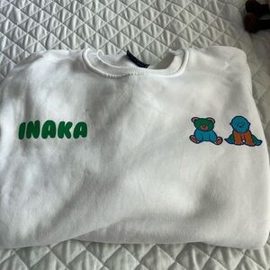 Inaka white sweatshirt with bear and monkey detail. White with colored images
